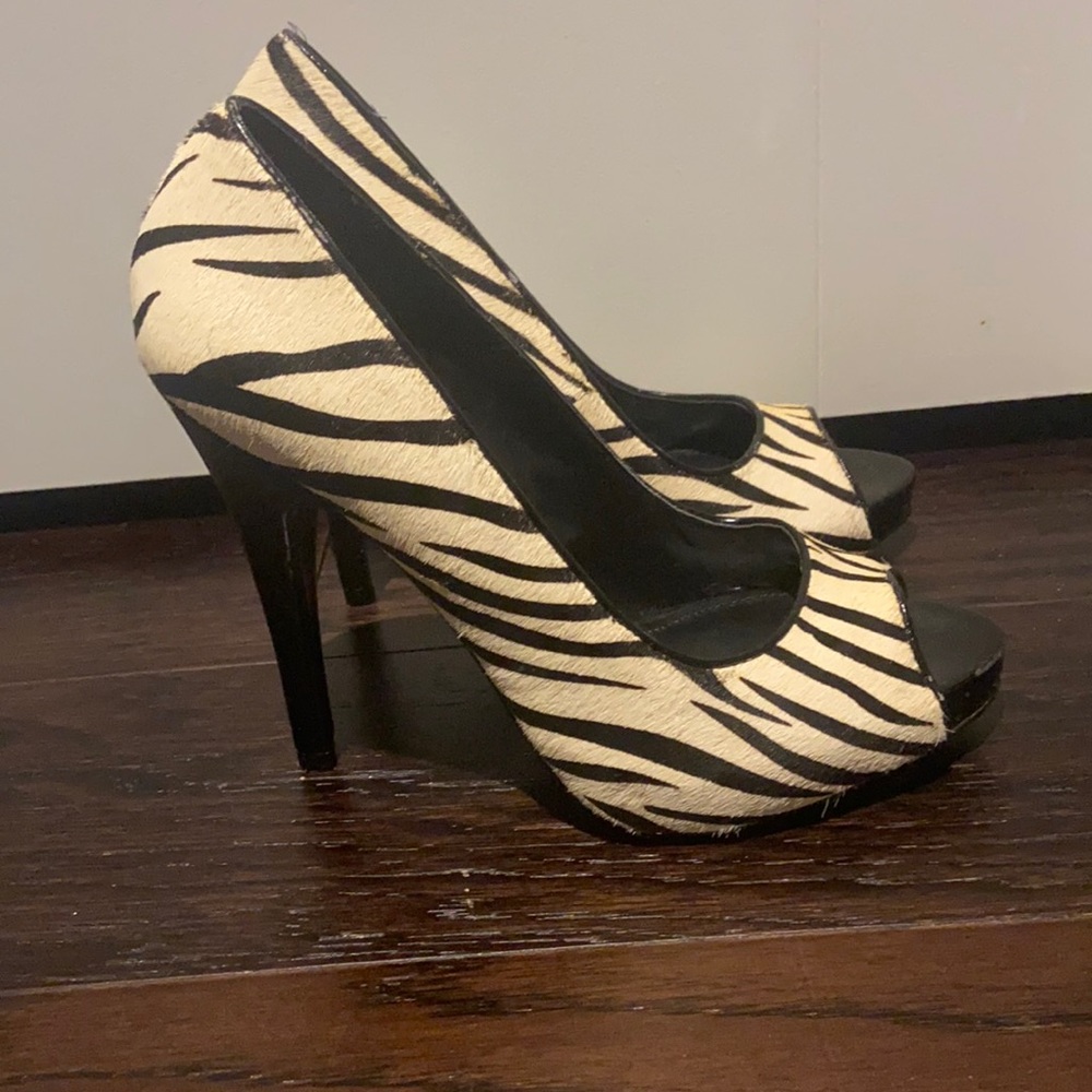 *Aldo White and Black Zebra print pony hair heels. Size 7.*